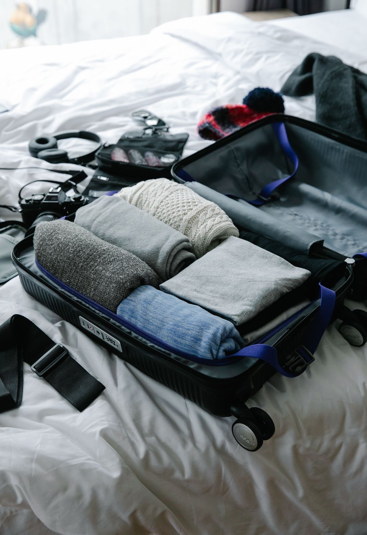 Folded clothes inside an open suitcase