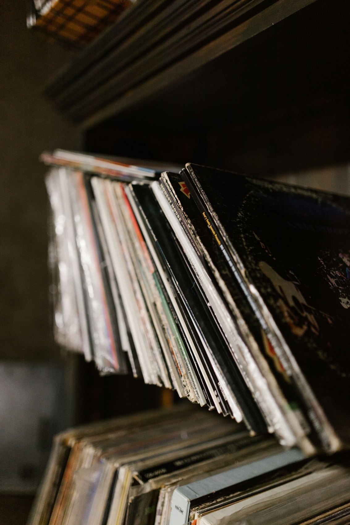 Vinyl record sleeves on a shelf