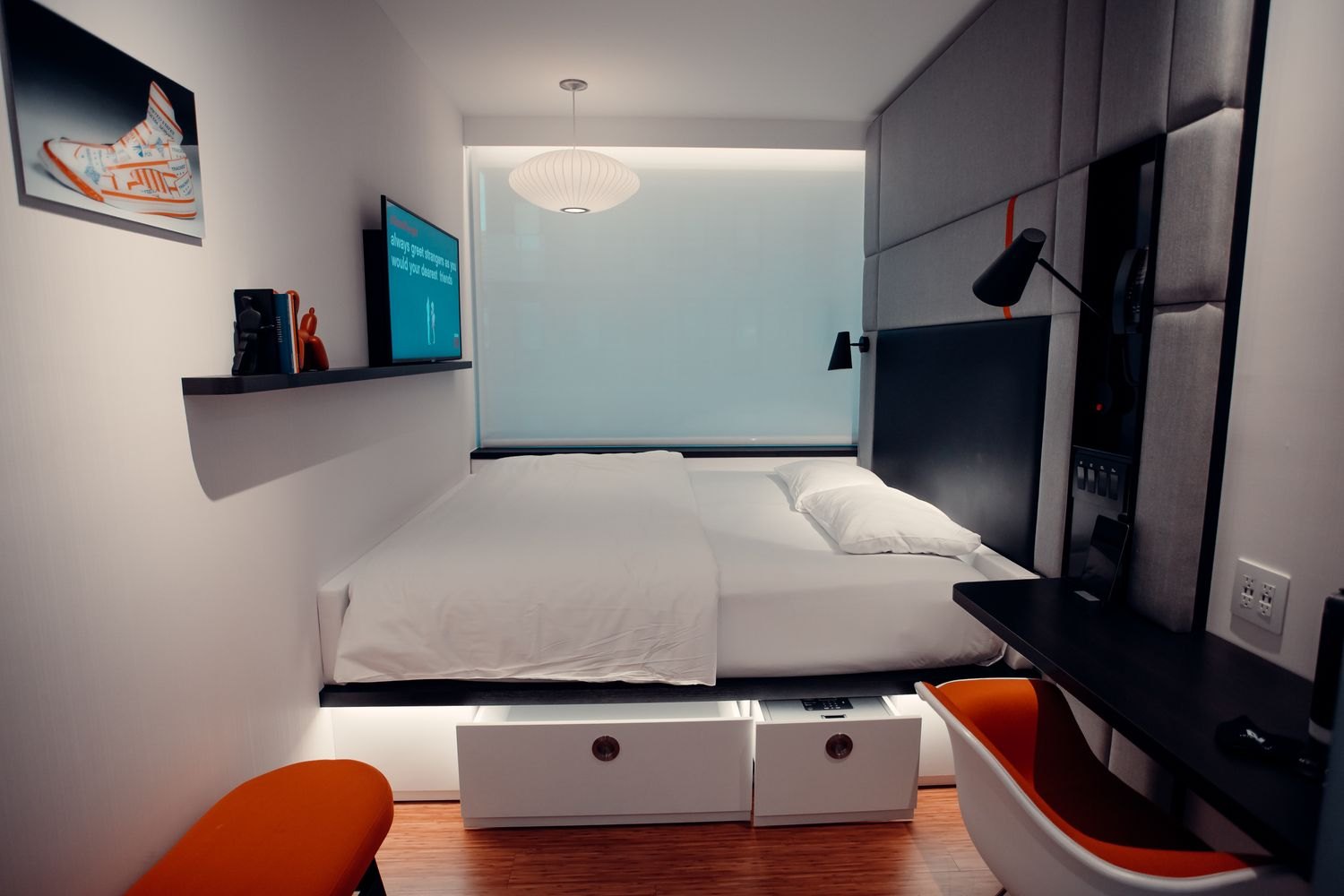 A bed with open storage drawers underneath