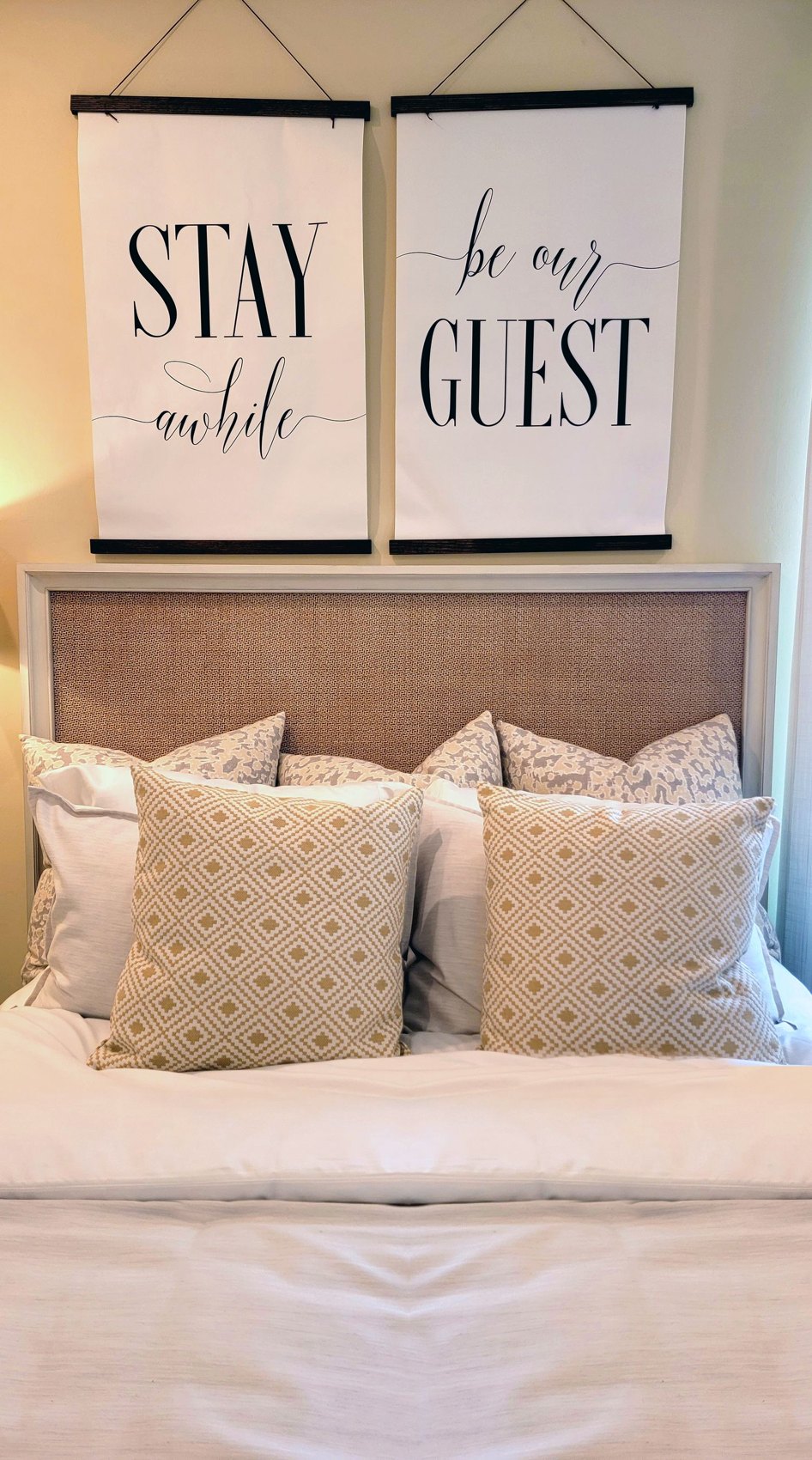 A tidy guest bed with pillows